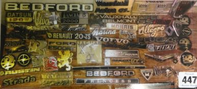 A collection of 1970`s and later car badges