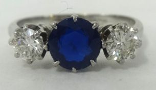 Sapphire and diamond three stone ring with Insurance valuation indicting sapphire 1.25 ct and
