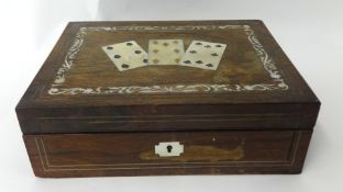 Rosewood and m.o.p inlaid games box with playing card design t/w brass oil lamp