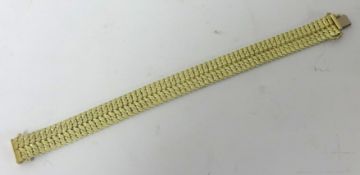 A 14ct gold bracelet, 20cm long, with diamond cut double herringbone links approximately 41.9g,