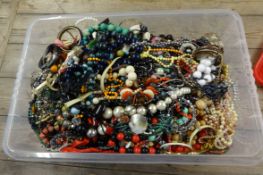 A large collection of costume jewellery in plastic box