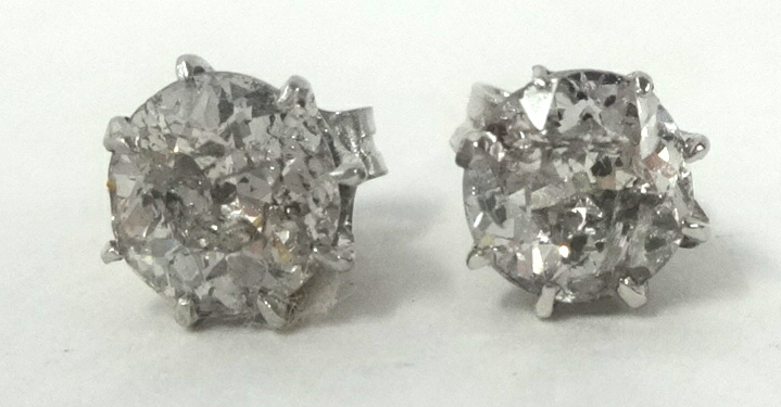 Pair of diamond round cut stud earrings