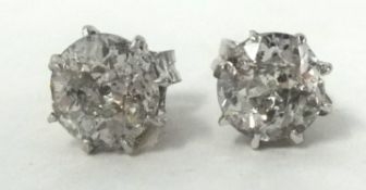 Pair of diamond round cut stud earrings
