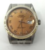 A Gents stainless steel Rolex Date Just Superlative wrist watch with guarantee No F696596 dated