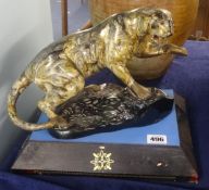 Painted metal sculpture of a tiger on wood plinth, Circa 1960
