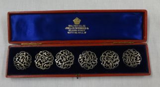 Walter Ellis, London, six silver buttons, cased