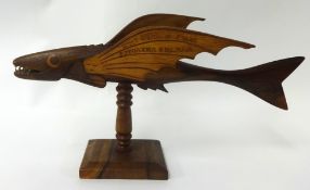 A Pitcairn Island carved `Flying Fish` on pedestal by Oliver Clark, 14.50cm long (Provenance; the