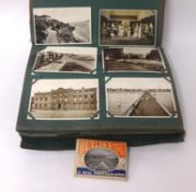 An album of various traditional postcards t/w set of 15 photos of Butlins