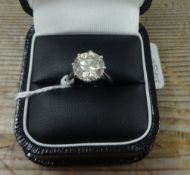 A large single stone diamond ring, approximately 4.02 carats, with copy of insurance valuation