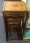 A nest of four Chinese carved rosewood tables