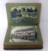 Two old postcard albums containing Edwardian and later cards including real photographic including