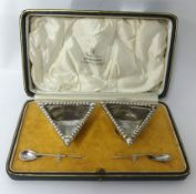 Pair of silver triangular table salts in fitted Brook and Son box with spoons, Edinburgh