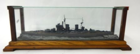 Four model ships in three cases including HMS King George, Yamato and USS Missouri