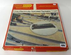 Hornby turntable and a Triang Inner City Express train set