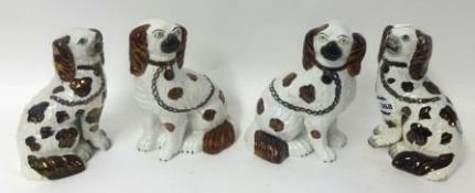 Two pairs of copper lustre and other Staffordshire dogs