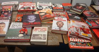 MANCHESTER UNITED MEMORABILIA various hardback, paperback, magazines, dvds and videos featuring