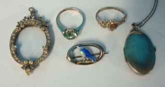 Five pieces of silver jewellery including enamelled bird on a branch brooch