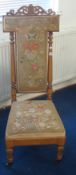 Victorian mahogany framed prayer chair with tapestry seat and back