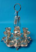 A silver plated six setting egg cup stand