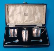 A five piece silver condiment set retailed by Bowden & Son Plymouth with original box