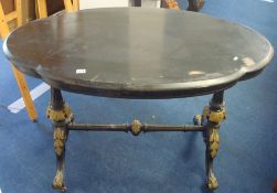 A Victorian ebonised and parcel gilt oval side table