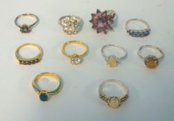 Ten silver dress rings