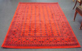 As new Turkish tekke bokhara rug on red ground, 235cm x 160cm