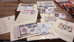A collection of World Cup 2002 First Day Covers and Stamps, also three MAN UTD 1999 `The Treble`