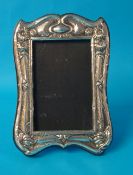 An Art Nouveau silver photo frame, 23cm tall