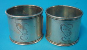 A pair of Russian silver napkin rings