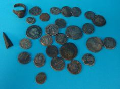 Collection of various Roman coins also a ring and axe head