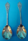 Pair of silver and pierced spoons with gilt bowls in original box retailer A & N.C.S Ltd