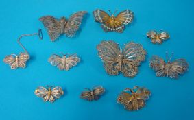 Ten silver and filigree butterfly brooches