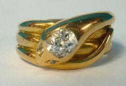 A middle Eastern yellow gold snake ring set with diamond indistinct marks, ring size O