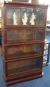 Four section globe Wernicke mahogany bookcase with extra top and drawer base (8 sections in total)