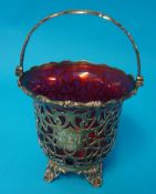 Victorian pierced silver swing handle sugar bowl with cranberry glass liner