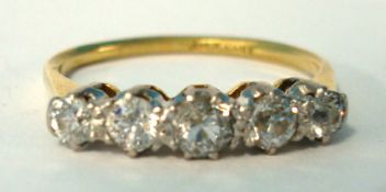 Antique five stone diamond ring set in 18ct gold and platinum with old cut diamonds, size L