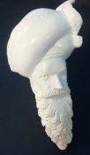 A carved Meerschaum style `Turks Head` pipe in fitted leather case