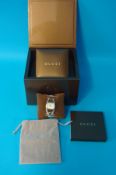 A ladies solid silver Gucci wrist watch with mother of Pearl dial with original boxes