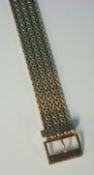 9ct heavy gauge bracelet of buckle design approx 56.5g, 22cm long, 23mm wide
