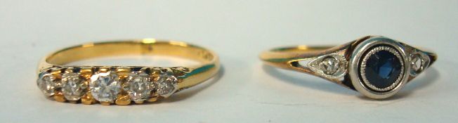 Two 18ct and diamond set dress rings