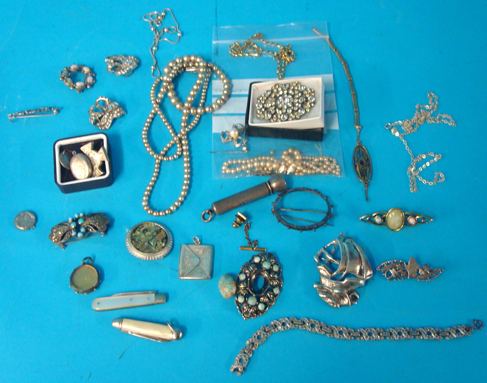 A collection of various traditional Costume Jewellery including silver brooches etc