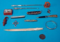 Various objects including fruit knives, silver button hooks, carvings, German type enamel cross