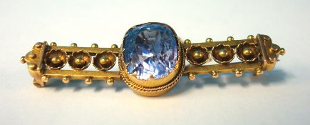 An Antique yellow metal brooch set with Ceylon Sapphire single stone 45mm long