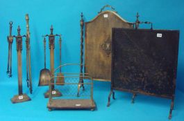 Two fire screens, brass companion sets and magazine rack