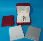 Ladies stainless steel Cartier Santos wrist watch with original boxes and booklets, purchased in