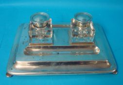 A large silver inkstand set with two original glass and silver mounted inkwells on bun feet, 31cm x