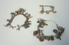 Three silver charm bracelets