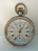 A silver Omega pocket watch with open face and triple dial