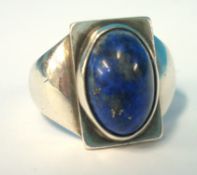 A Georg Jensen silver ring with oval cut lapis, 37g